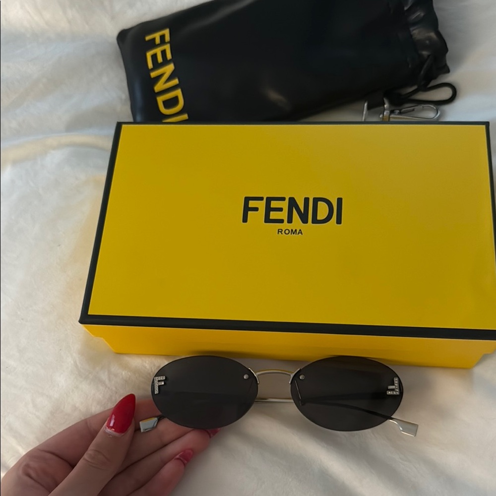 Fendi Black Oval Sunglasses with Yellow Case